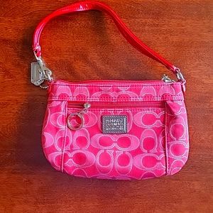 Coach purse in pink.